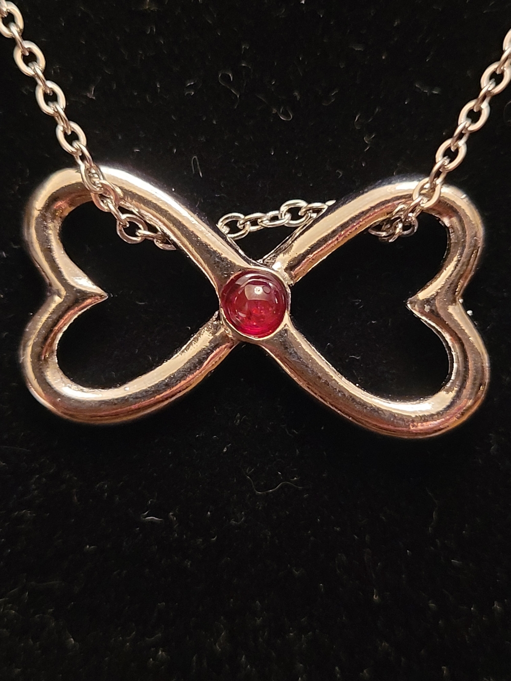 Harriet Carter Genuine Ruby Pendant Silver Tone Bow/Infinity Design Necklace USA